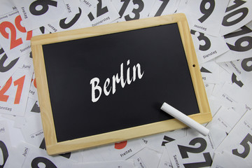 Berlin auf eine Tafel geschrieben