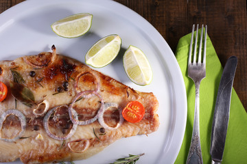 Dish of Pangasius fillet with spices and vegetables
