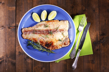 Dish of Pangasius fillet with rosemary and lime