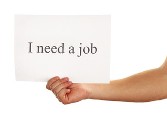 Sheet of paper with inscription I need a job in male hand