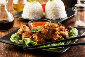 Fried chicken pieces in batter