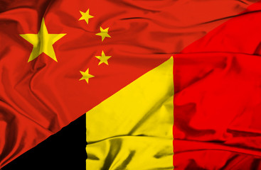 Waving flag of Belgium and China