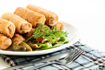 Delicious croquettes with meat and salad