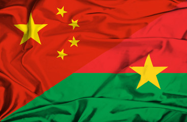 Waving flag of Burkina Faso and China