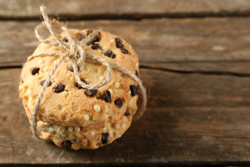 Tasty cookies on rustic wooden background