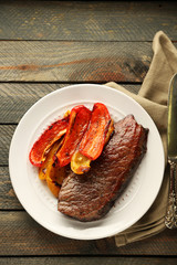 Composition with tasty roasted meat  and vegetables