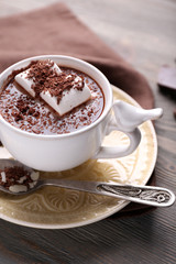Hot chocolate with marshmallows in mug,