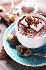 Hot chocolate with marshmallows in mug,