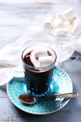 Hot chocolate with marshmallows in glass,