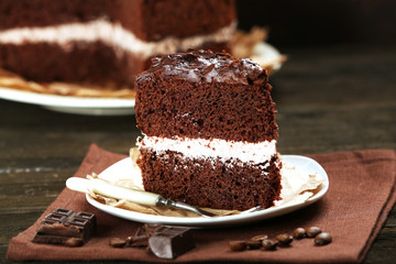 Delicious chocolate cake on table close-up