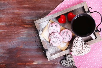 Pink cookies and cup of coffee for  Valentines Day