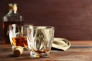 Whiskey on wooden background