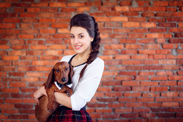 beautiful girl with dachshund