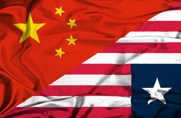Fototapeta premium Waving flag of Liberia and China