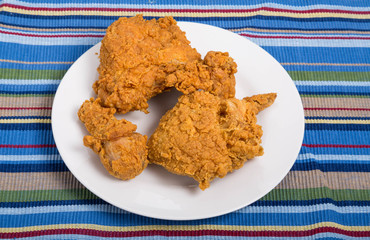 Fried Chicken on White Plate and Striped Towel