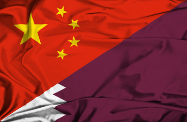 Waving flag of Qatar and China