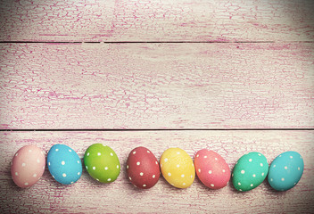 Easter eggs on wooden background