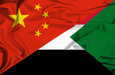Waving flag of Sudan and China