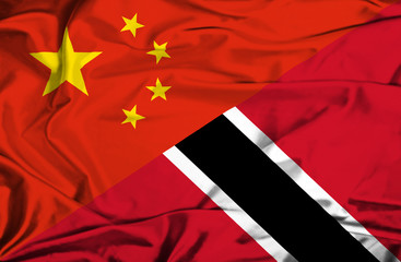 Waving flag of Trinidad and Tobago and China