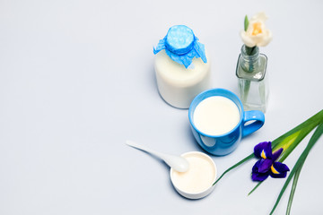 Still life with milk, dairy products,flowers, white tulips