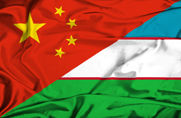 Waving flag of Uzbekistan and China