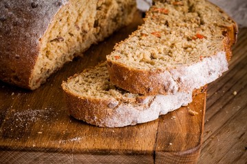 fresh rye bread on a cutting board closeup