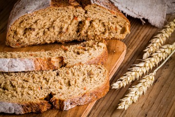 fresh rye bread on a cutting board