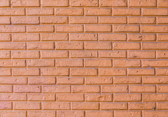 brick wall with orange color paint,old condition
