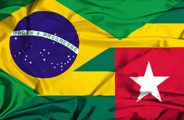 Waving flag of Togo and Brazil