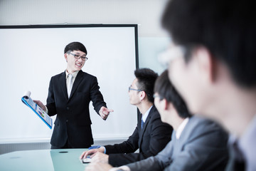 Business man making a presentation at the office