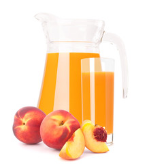 Peach fruit juice in glass jug