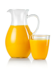 Jug and glass with orange juice isolated on white