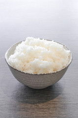 japanese rice in bowl on wood