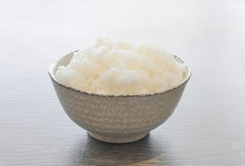 japanese rice in bowl on wood