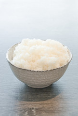 japanese rice in bowl on wood