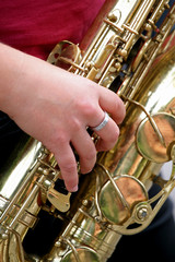 Fototapeta premium Woman playing sax