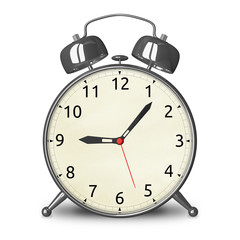 Metallic alarm clock isolated