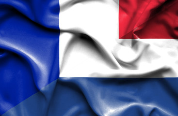 Waving flag of Netherlands and France