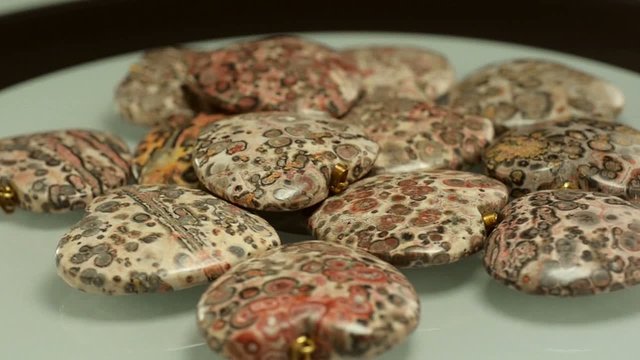 Rotating leopard skin jasper hearts