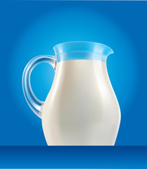 fresh milk in jug on blue background