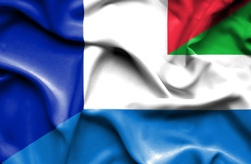 Waving flag of Sierra Leone and France