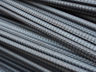 Steel rods or bars used to reinforce concrete