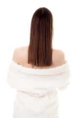 Naklejka premium Sexy young female taking off white bathrobe, back view
