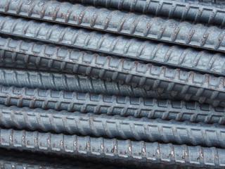 Steel rods or bars used to reinforce concrete