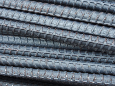 Steel rods or bars used to reinforce concrete