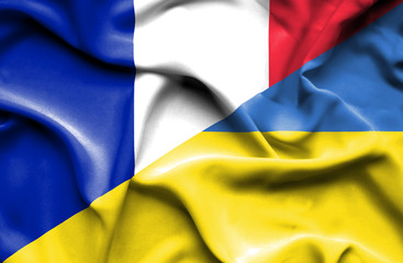Waving flag of Ukraine and France