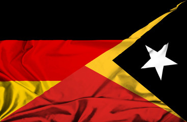 Waving flag of East Timor and Germany