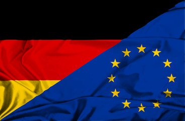 Waving flag of European Union and Germany