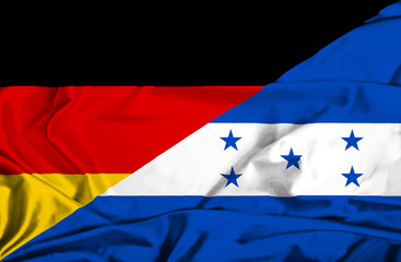 Waving flag of Honduras and Germany