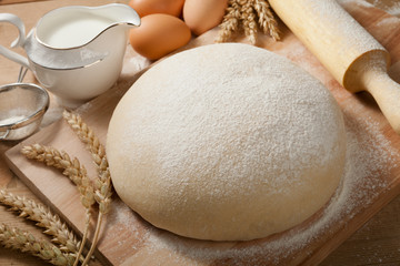 Fresh dough on the table.